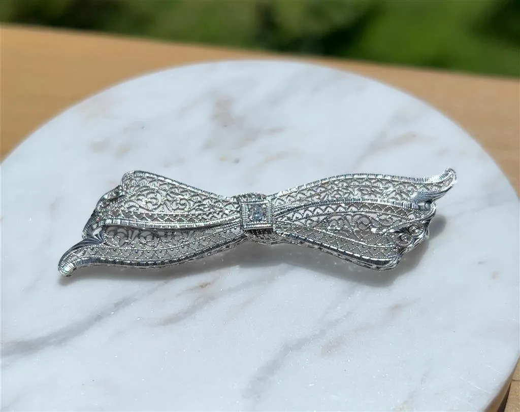 Estate 14K White Gold 0.07ctw Round Diamond Filigree Bow Brooch