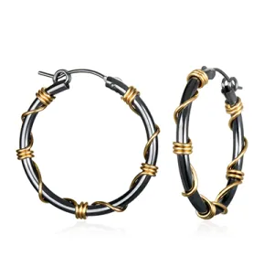 Oxidized silver hoop earrings wrapped with gold wire by Suzanne Q Evon