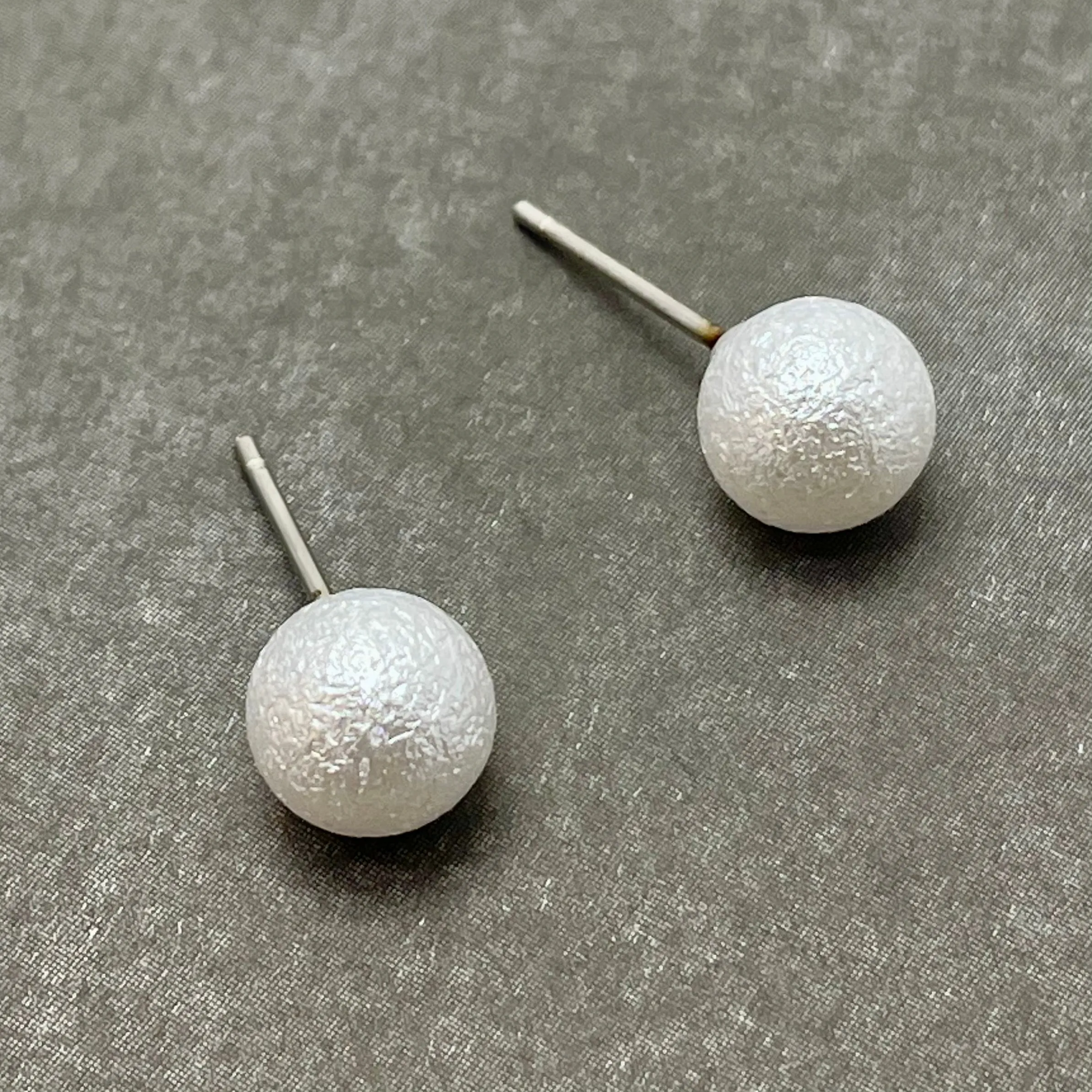 Pearl White Pitted Lucite Mini Ball Stud Earrings